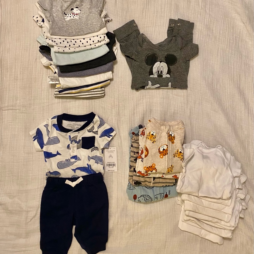 Newborn baby boy lot of clothes. Almost all were washed but never used.